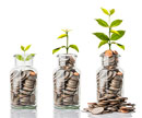 money in jars, increasingly filled with coins