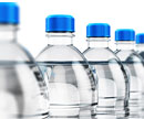 Row of plastic water bottles