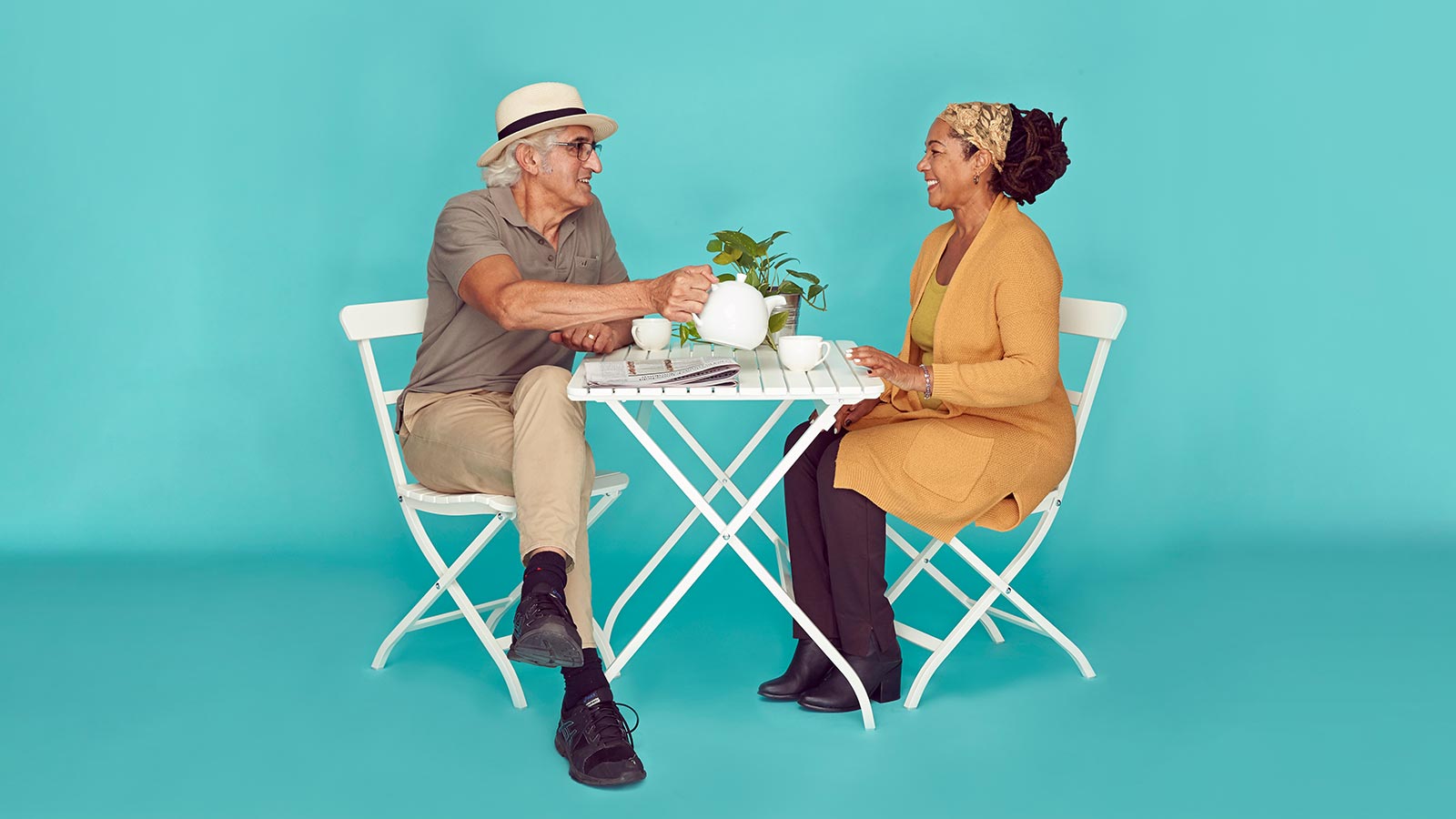 Couple drinking tea and talking.